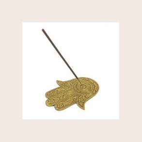 Rgelses holder Fatimas hnd guld