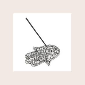 Rgelses holder Fatimas hnd slv