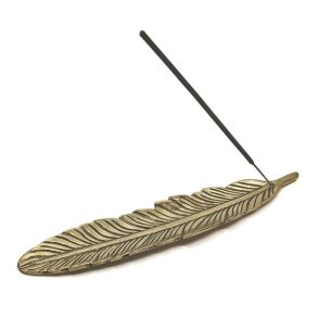 Rgelses holder fjer guld