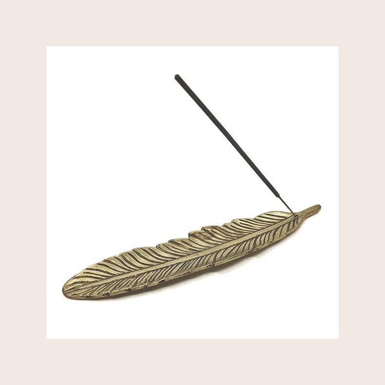 Rgelses holder fjer guld